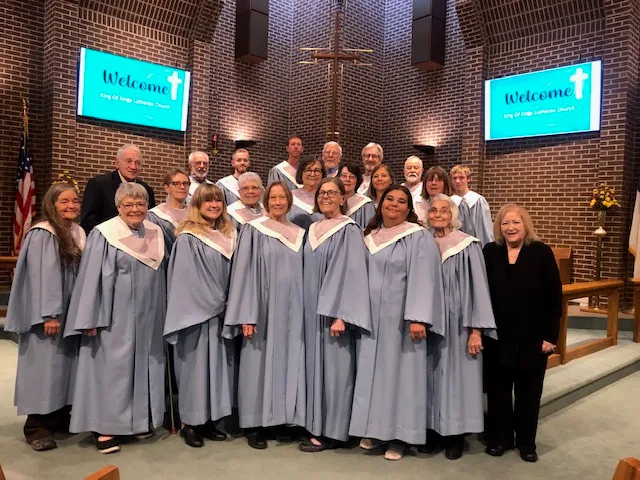 The Chancel Choir of King of Kings Lutheran Church in their choir robes.