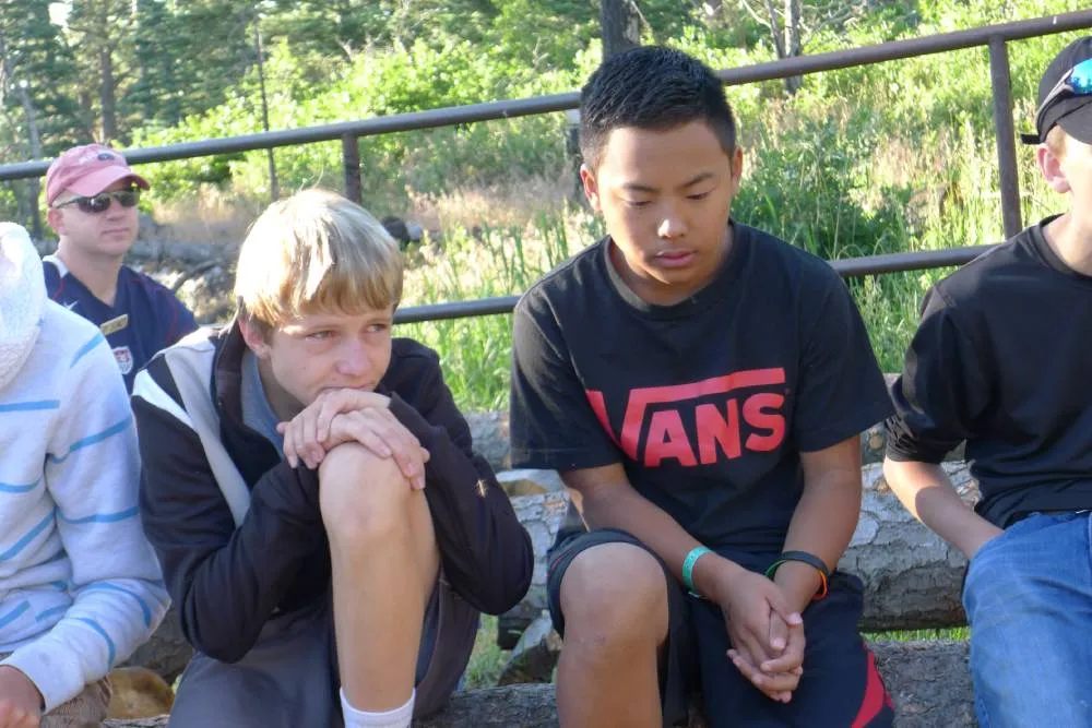 Praying together at Rainbow Trail Lutheran Camp during Confirmation Camp.
